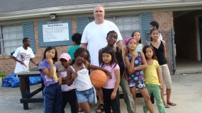 Mark with refugee children.