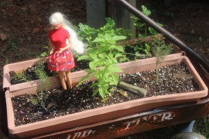 Barbie with her head back on Thank goodness for turtlenecks.