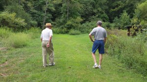 Mr. Alley and Mr. Alley taking a walk out back to see the 